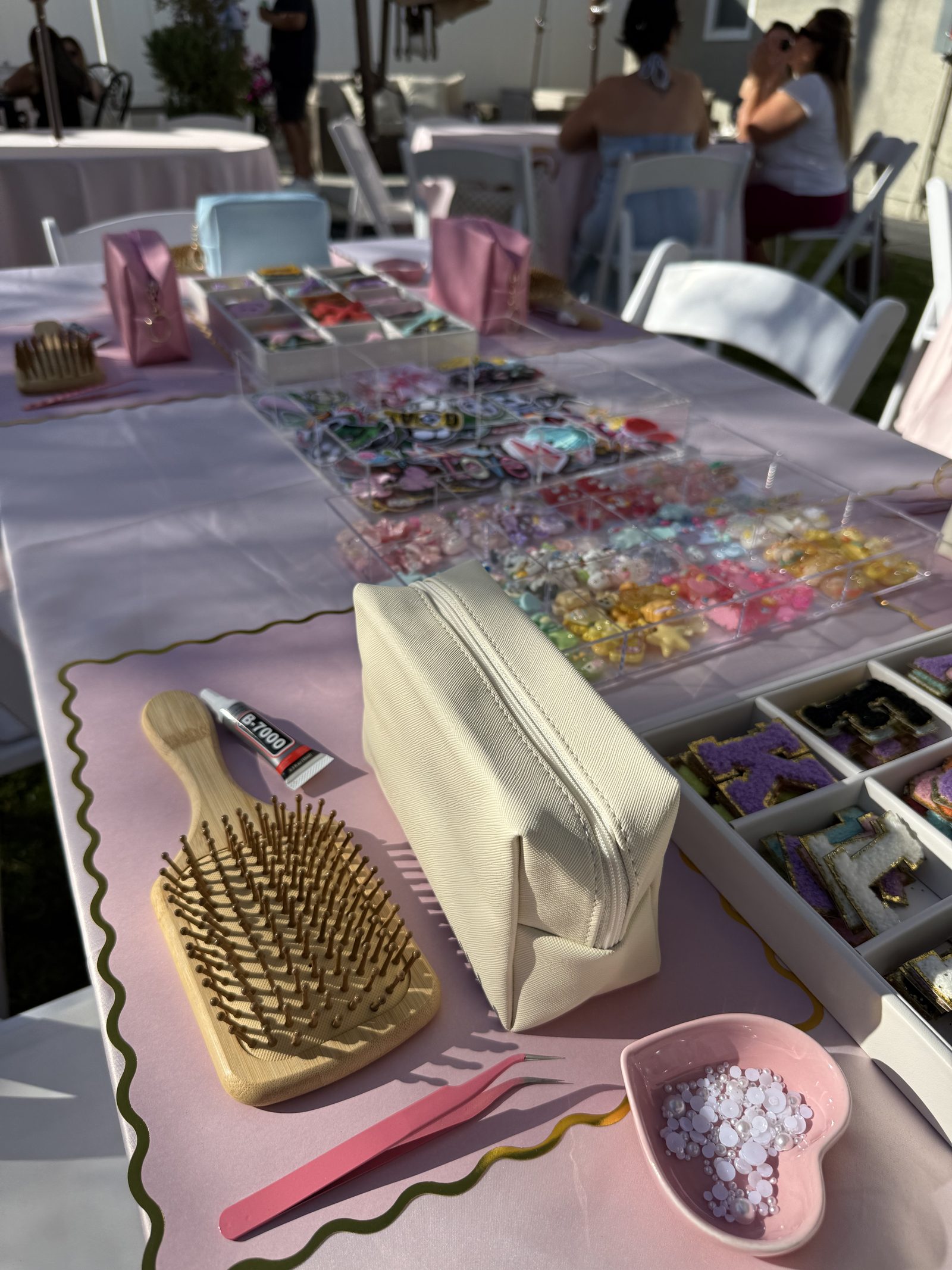The Bedazzle Bar at a Los Angeles kids' birthday party — A bedazzling-station experience for guests who love sparkle. Kids personalize a
