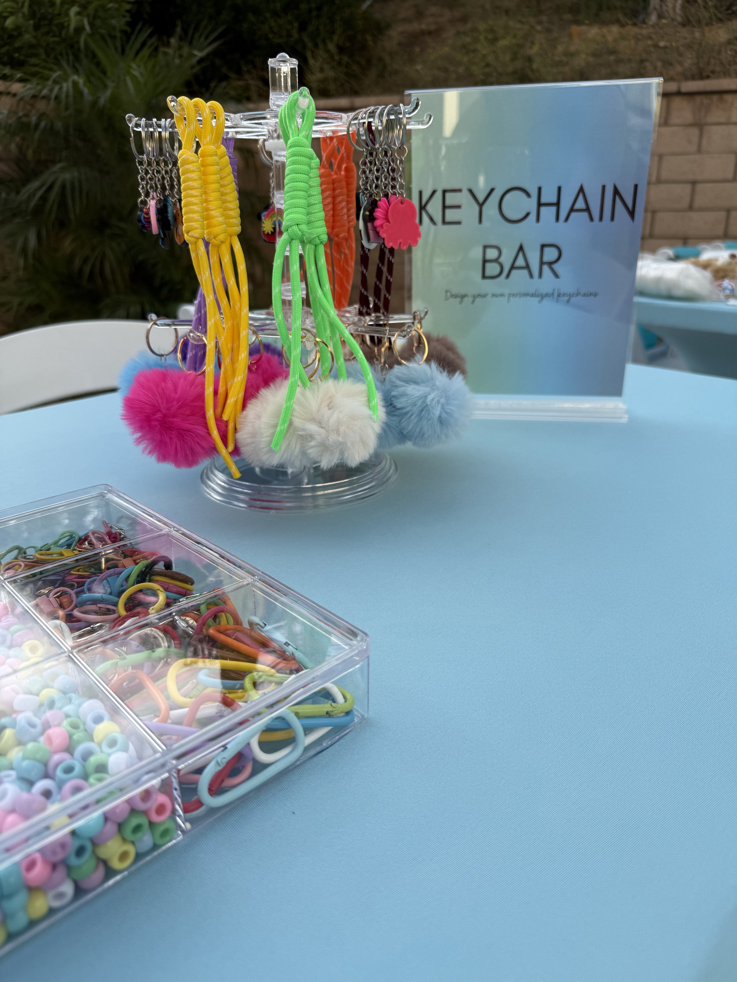 The Keychain & Charm Bar at a Los Angeles kids' birthday party — A simpler, faster experience perfect for younger guests or paired alongside anot