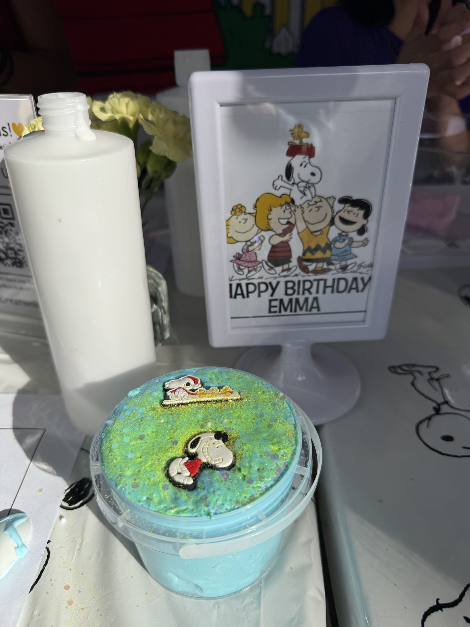 Styled slime bar at a Los Angeles backyard birthday party
